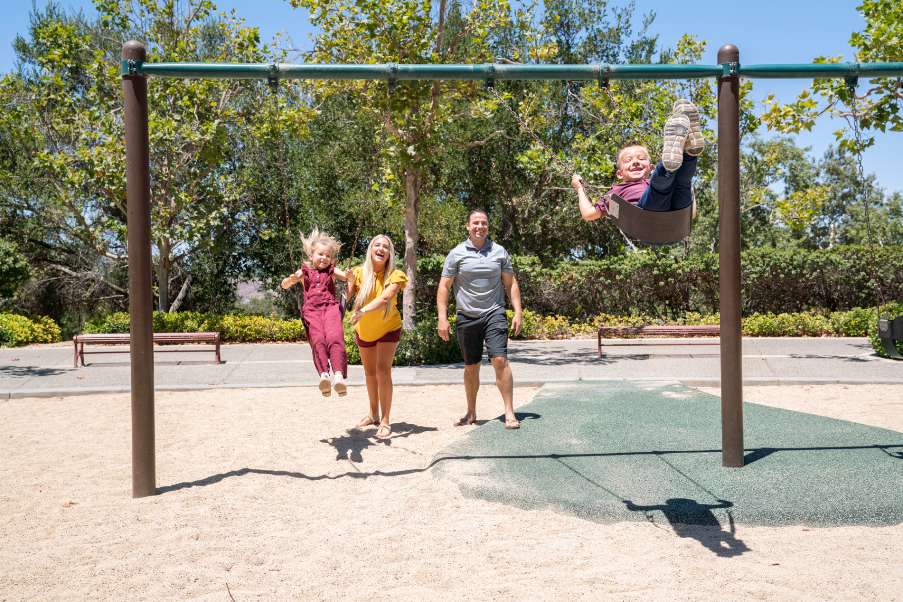 Jacob Lawlor and his family at a Las Flores neighborhood park playground