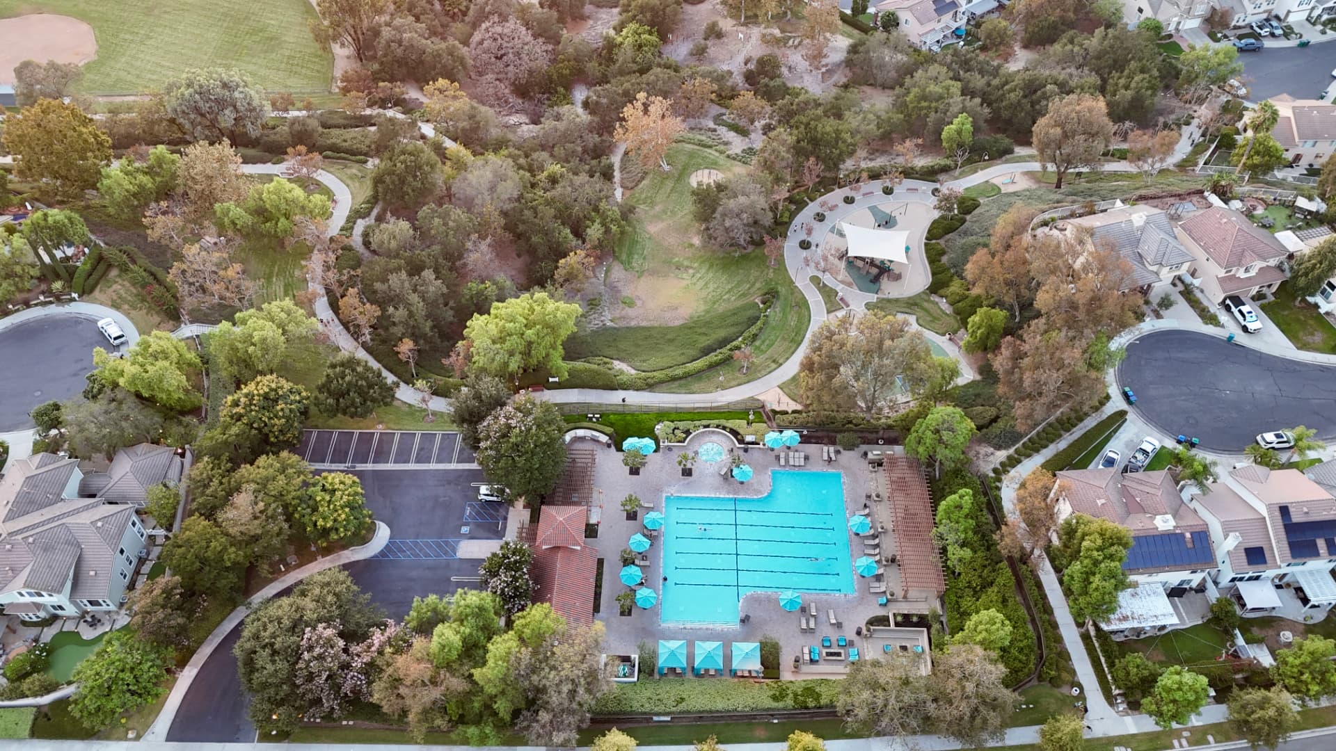 Aerial view of Oak Tree Park, its trails and the Las Flores community pool